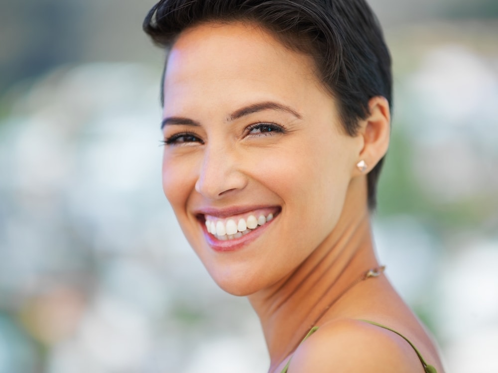 Closeup Smiling Girl with short brown hair